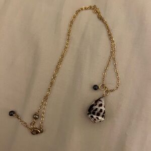 Hebrew cone shell necklace
